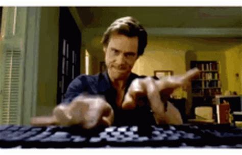 jim carrey typing gif|jim carrey typing fast meme.